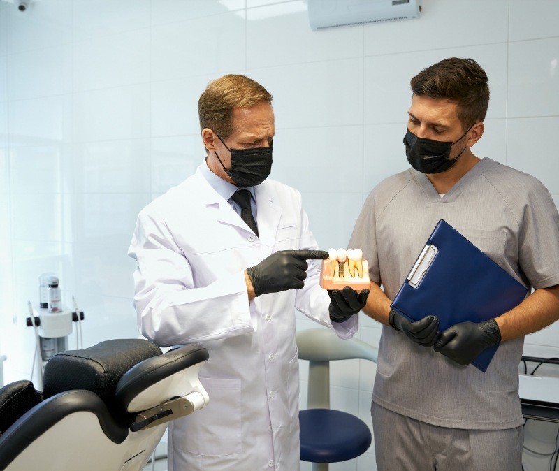 Dentist explaining biocompatibility testing