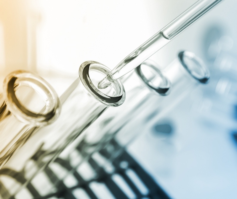 Closeup of test tubes during biocompatibility testing