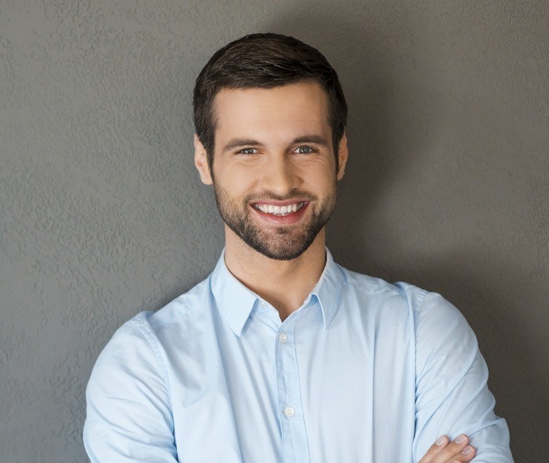 Man sharing flawless smile after cosmetic dentistry