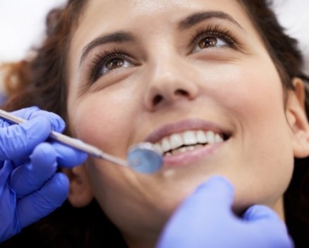 Dental patient receiving six month dental checkup
