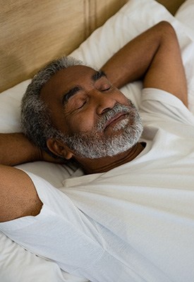 Man sleeping in a bed