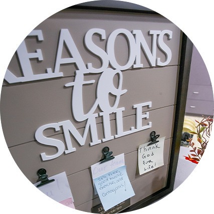 Sign in Beachwood dental office saying reasons to smile