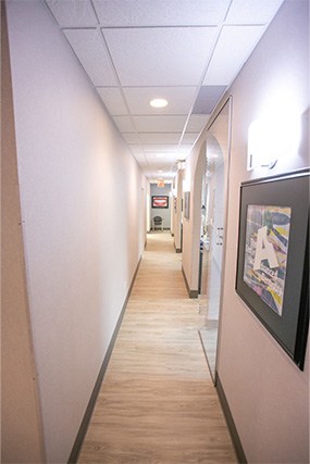 Hallway leading to dental treatment rooms