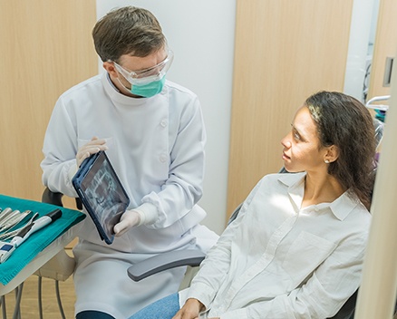 Patient and dentist discussing treatment plan