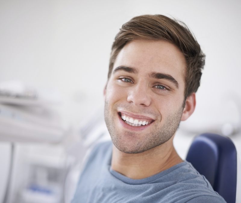 Man with flawless smile after veneers