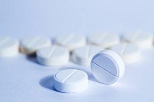 Pills sitting on a table.