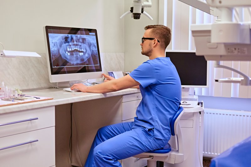 Dentist preparing patient for a full mouth reconstruction