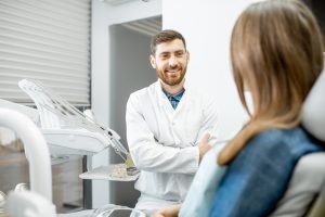 Dentist and patient discussing the details of a smile makeover