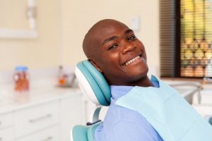 man smiling after full mouth reconstruction