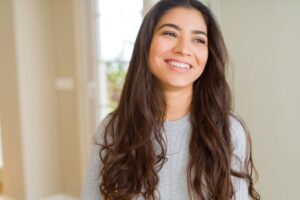 Portrait of smiling young woman with perfect teeth